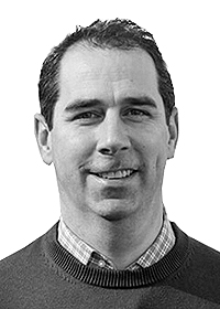 Black and white picture of Kieran Brady, CFO